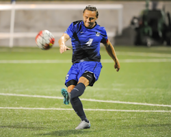 Player kicking ball